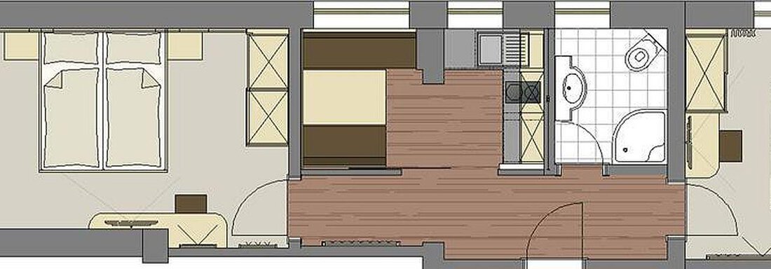 A floor plan drawing of an apartment with two bedrooms, a bathroom, and an open living area. The rooms are clearly structured and well arranged. - Haus Fridolin - Sölden