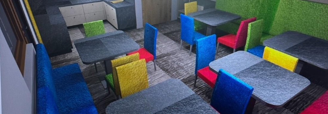 Animation Frühstücksraum A colorful interior with tables and chairs in various vibrant colors. The kitchen is modern and well-equipped. - Haus Sieglinde Color - Sölden
