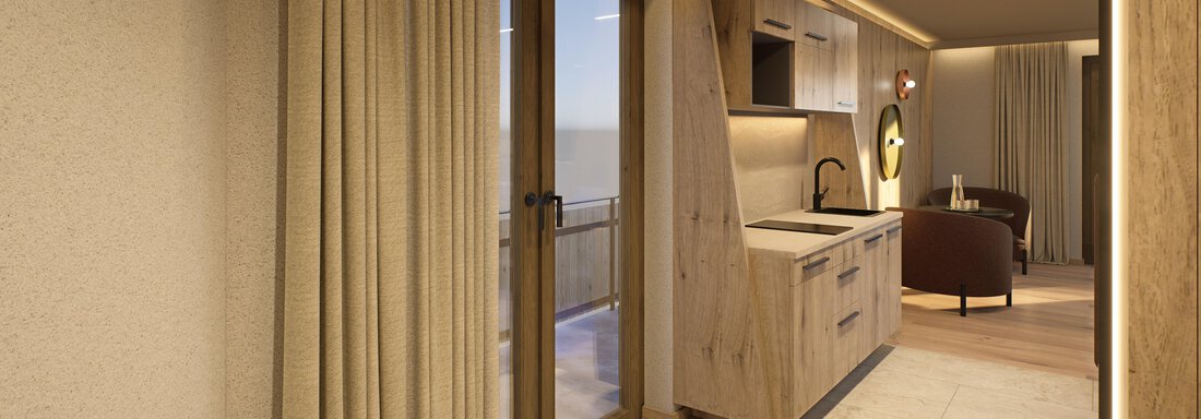 A modern apartment with wood and stone accents. The kitchen is open and bright, with a large window front that floods the space with light. - Hotel Alpina - Sölden