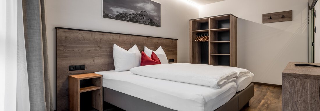 Schlafzimmer | © Rudi Wyhlidal, Hotel Regina Fiegl GmbH (CC C) Schlafzimmer - The Residence by Regina - Sölden