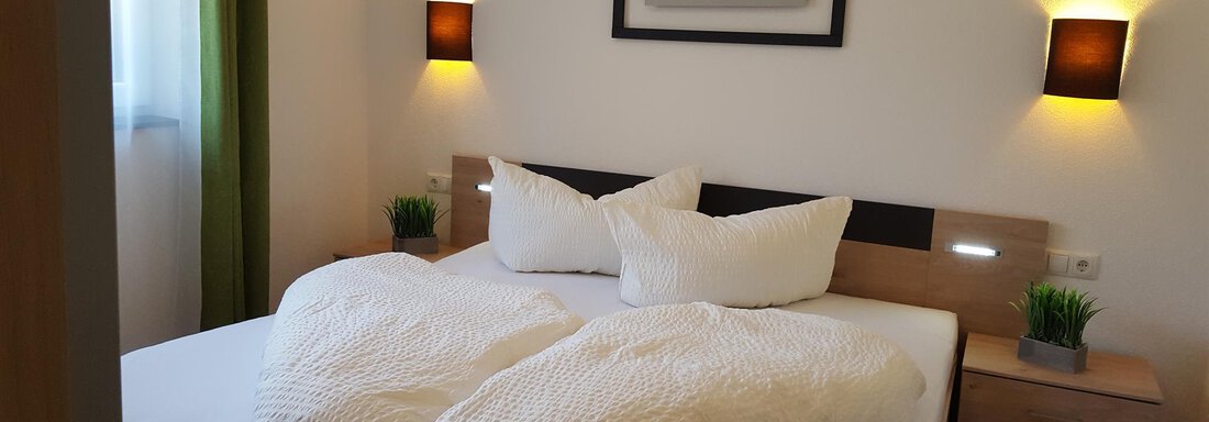 schlafzimmer - Alpenappartement Sonne - Umhausen