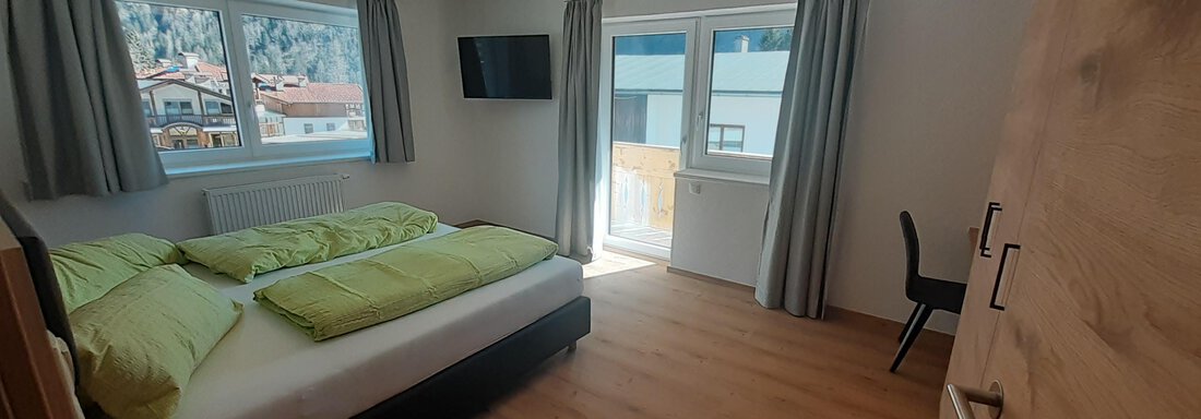 Schlafzimmer Schlafzimmer - Ferienhaus Haueis - Umhausen