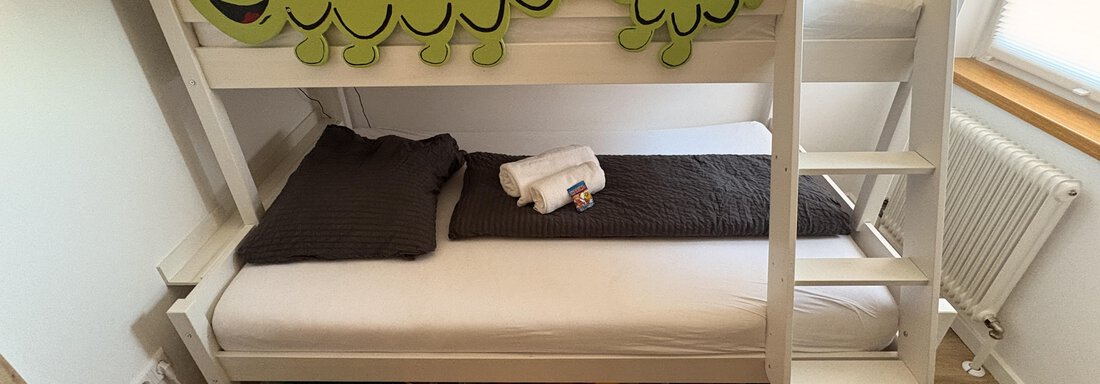 Schlafzimmer mit Stockbett und Spieleboxen - Oetztal Auszeit Top 7 - Umhausen